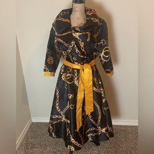 Black, gold chain print dress.